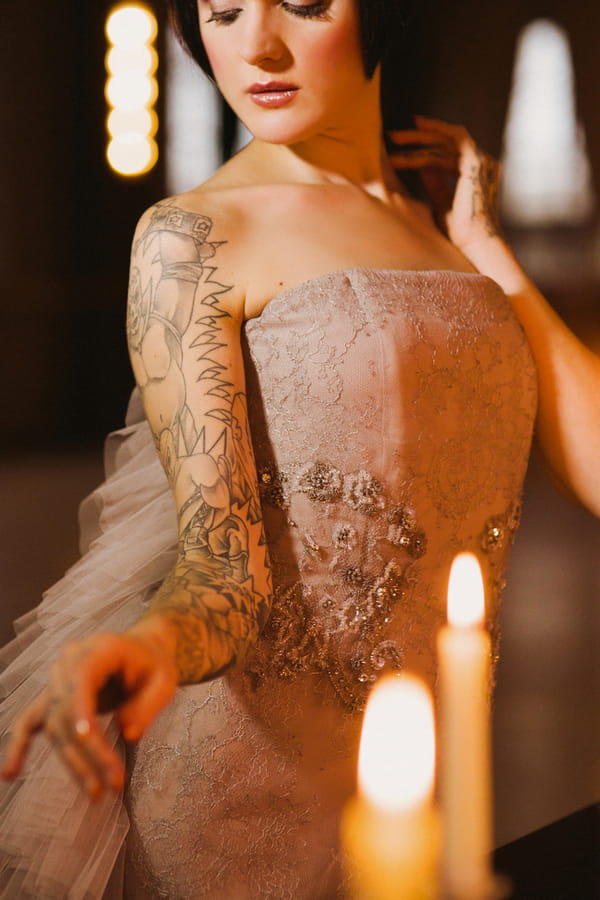Detail on bride's silver wedding dress