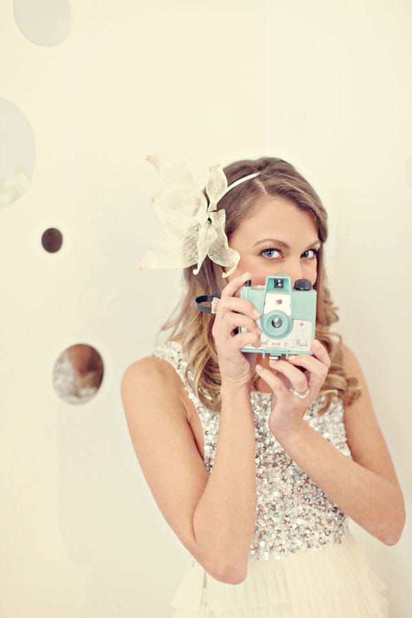 Bride holding camera