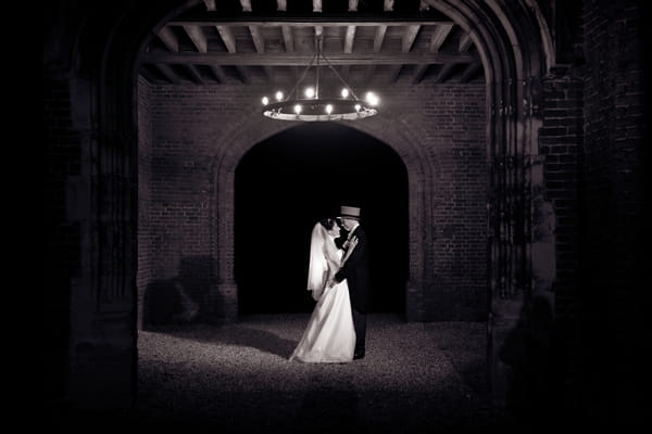 Couple Under Leez Priory Tower at Night