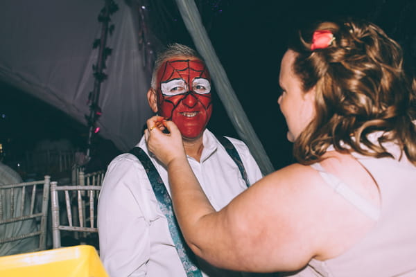 Man with Spiderman face paint