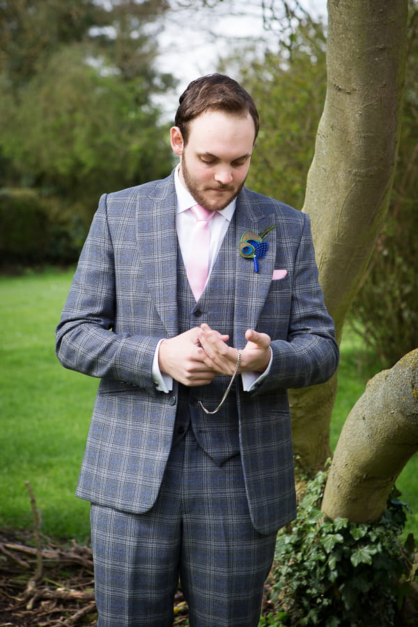 Groom checking watch