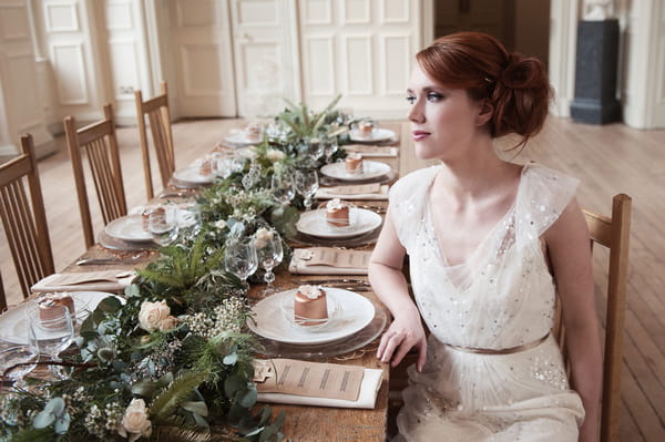Bride sitting at table