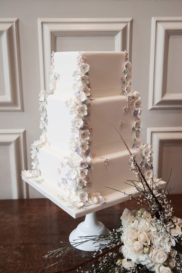 Ivory wedding cake with sugar flowers