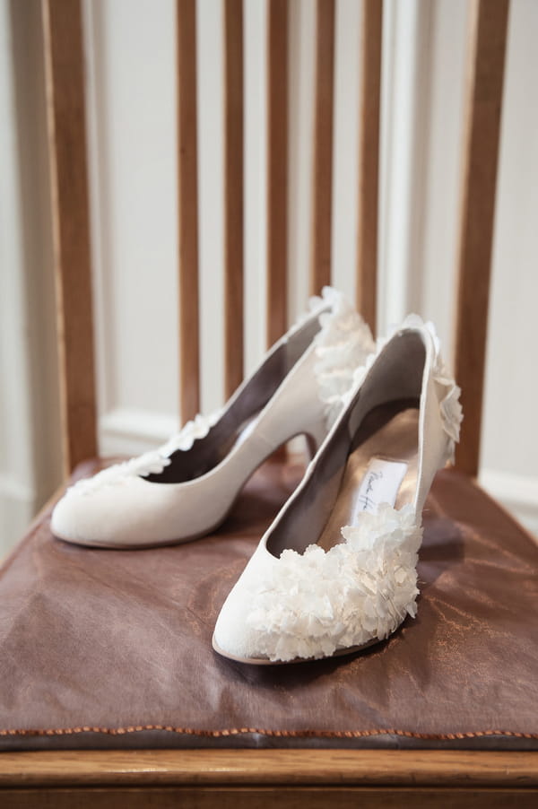 Wedding shoes on chair