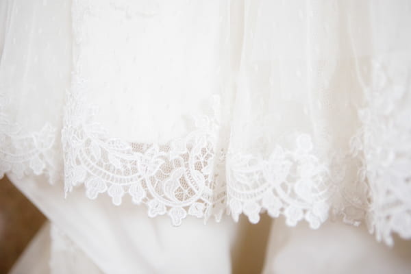 Detail on hem of wedding dress