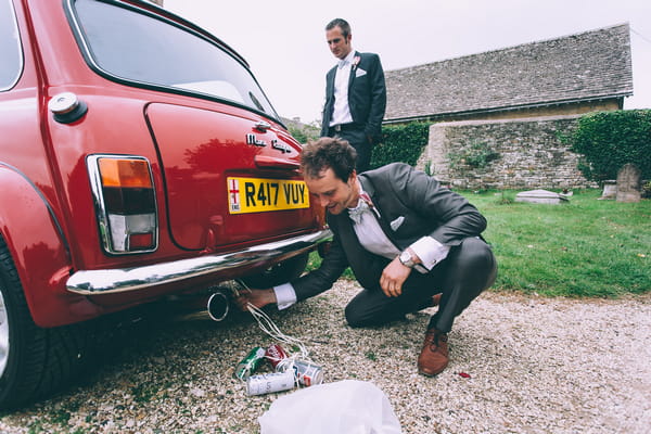 Tying cans to wedding car