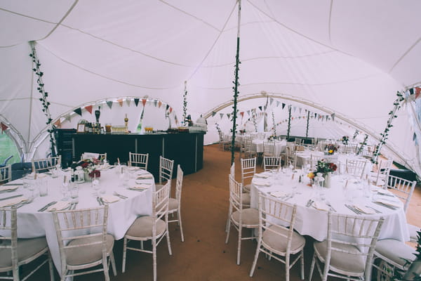 Wedding tables inside marquee