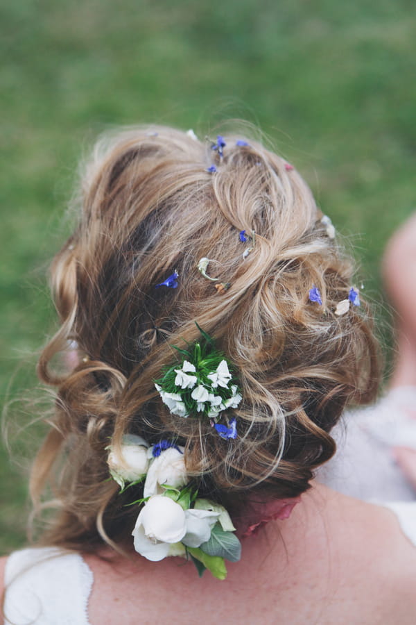 Confetti in bride's hair