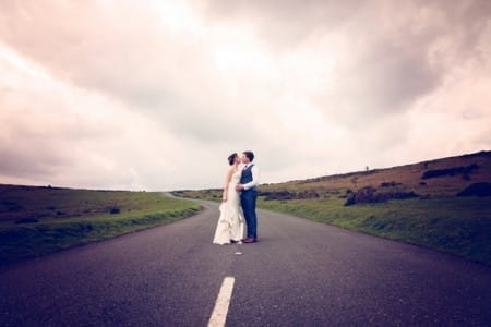 Couple standing in the middle of the road - Picture by McKenzie Brown Photography