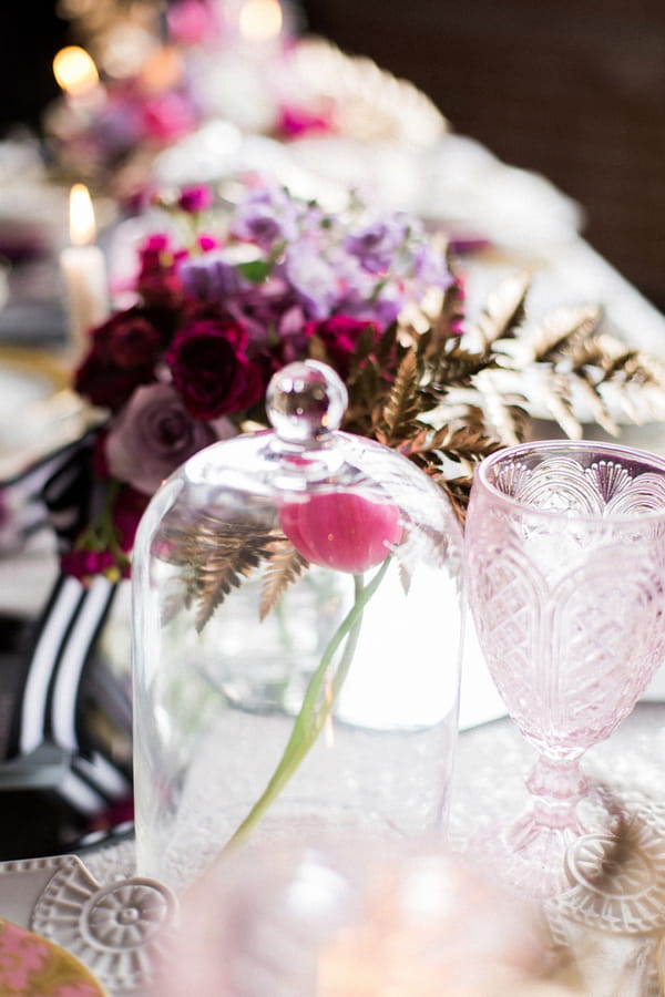 Flower in glass container on wedding table