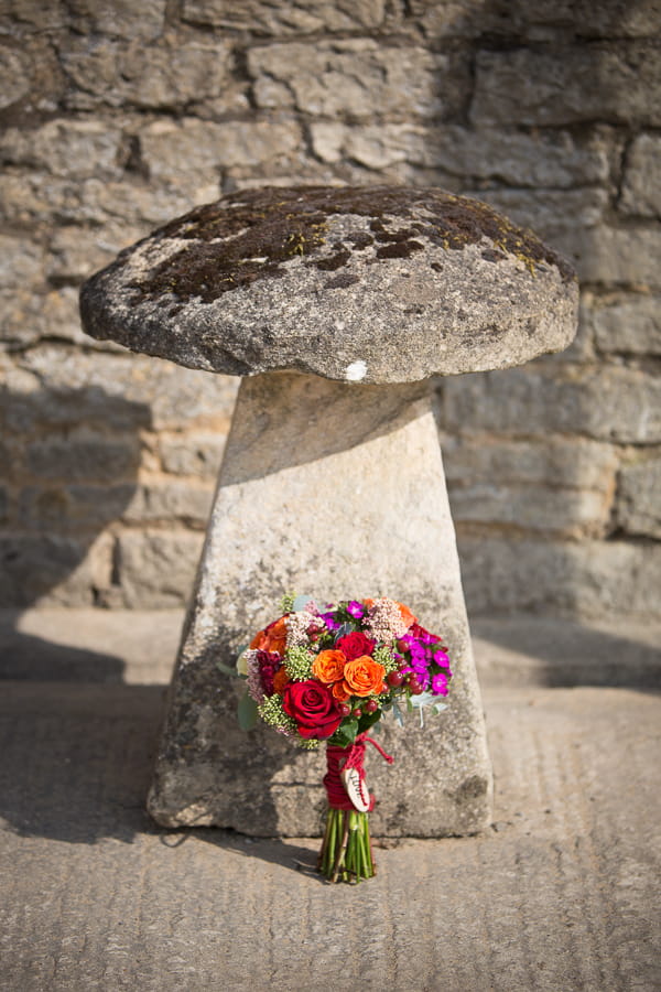 Stone stool with wedding bouquet