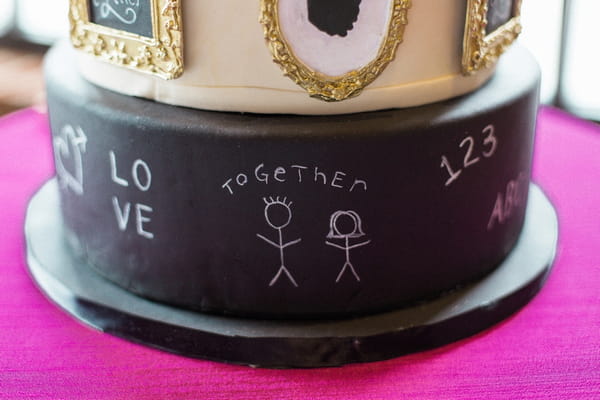 Detail on school themed wedding cake