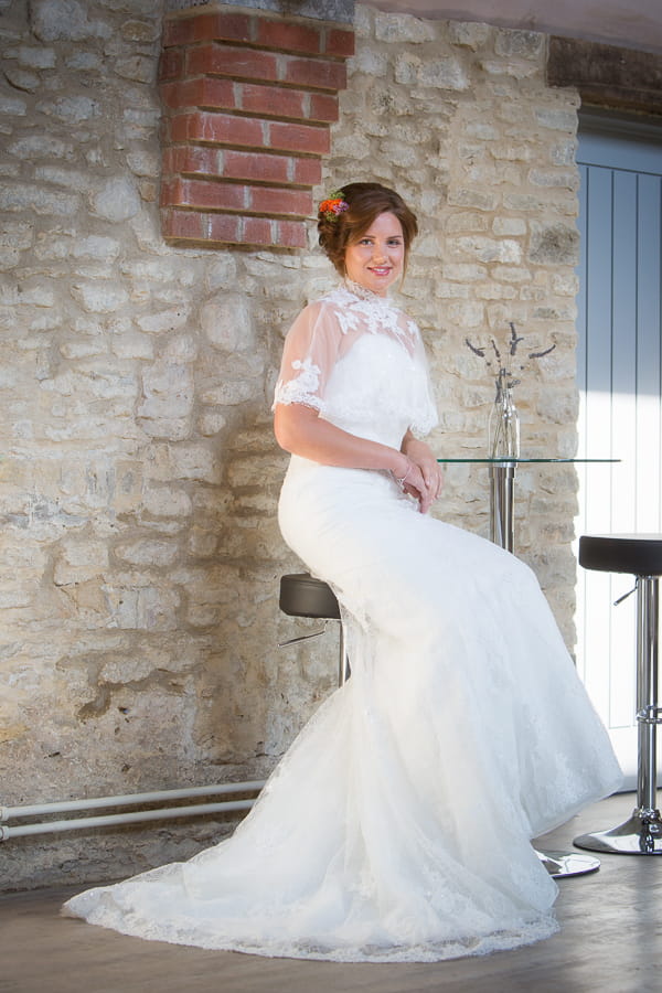 Bride sitting on stool