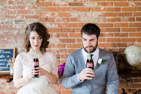 Couple drinking Coka Cola