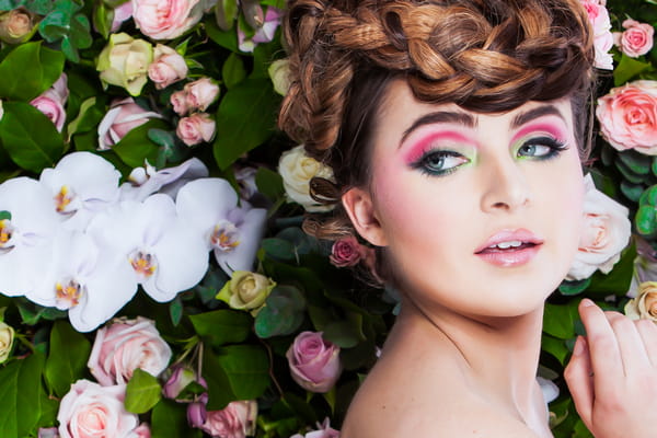 Bride with updo and bright pink eye make-up