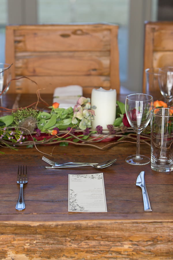 Wedding place setting on wooden table