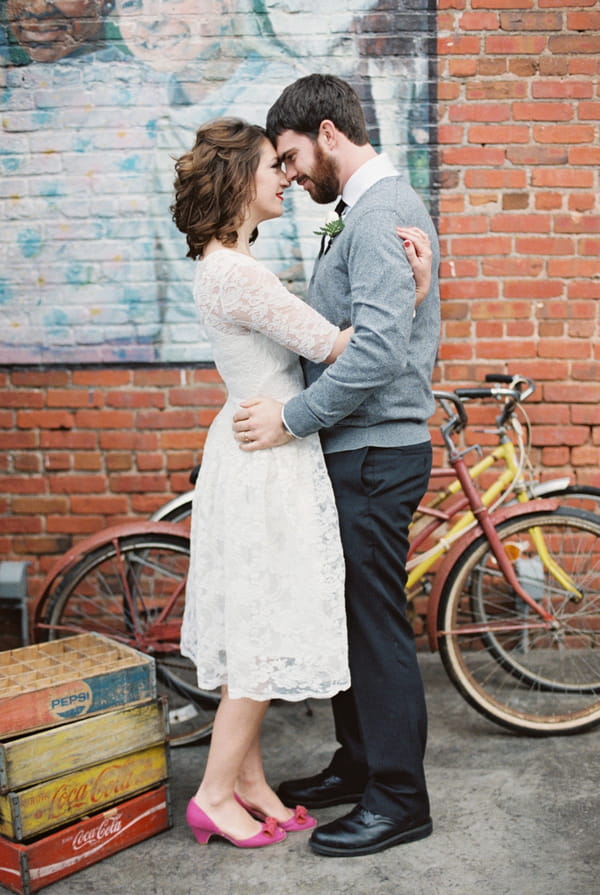 Couple in front of bicycle