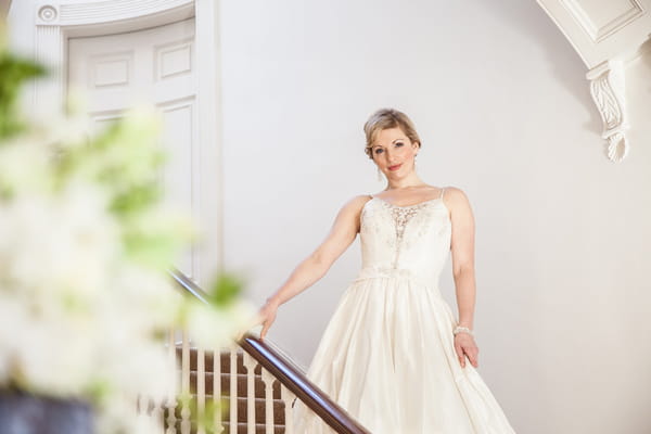 Bride standing on stairs