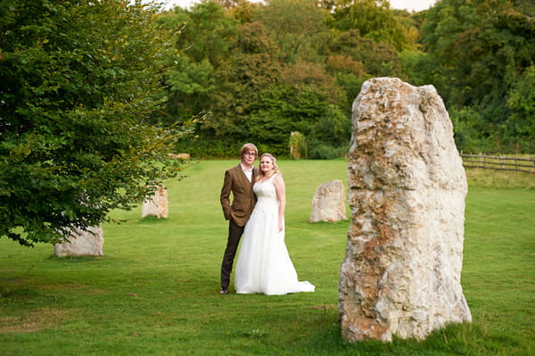 Bride and groom in grounds of The Lost Village of Dode