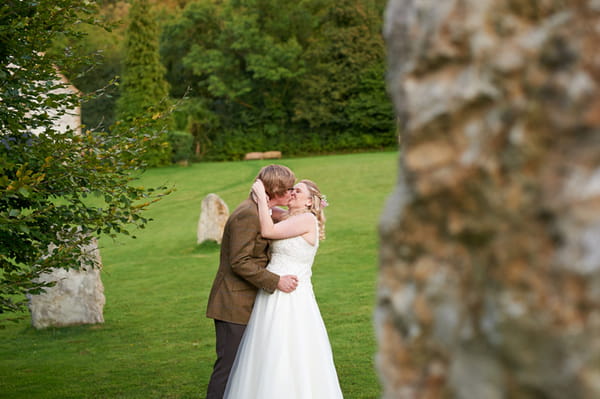 Bride and groom kissing