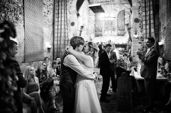 Bride and groom kiss during first dance