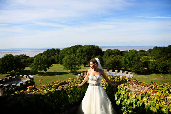 Bride standing in front of view from Walton Castle