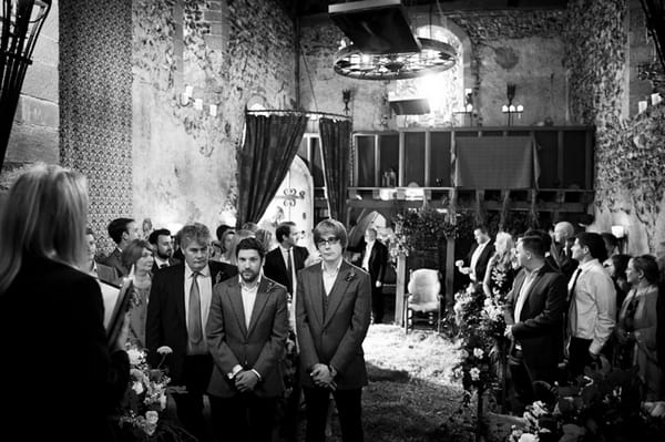 Groom waiting for bride at altar