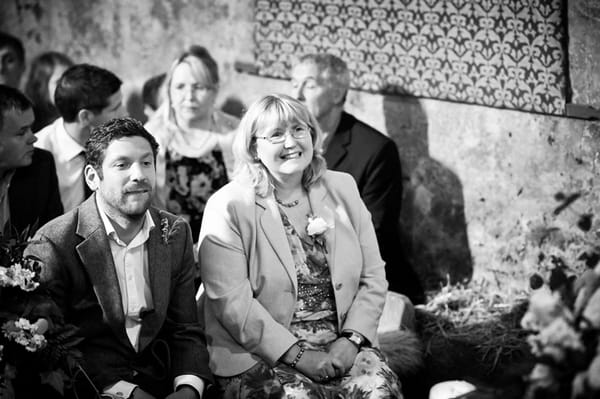 Proud mother smiling as daughter gets married