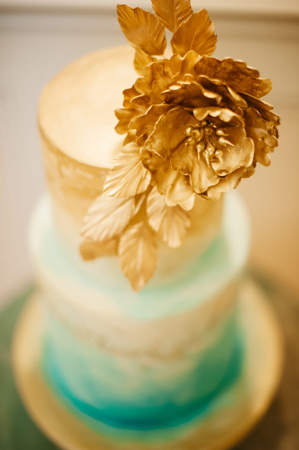 Ombre aqua and gold wedding cake