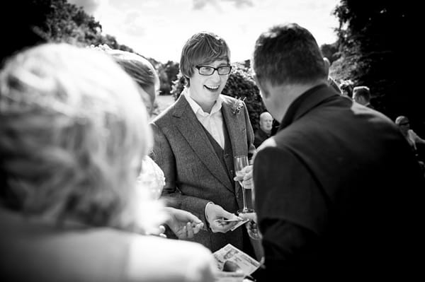 Magician doing magic trick at wedding