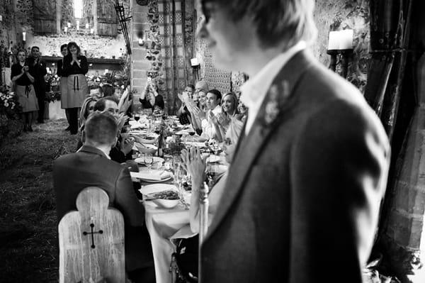 Groom entering wedding breakfast