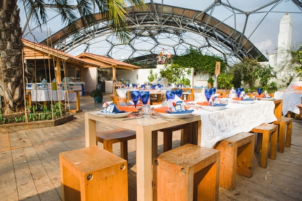 Wooden wedding tables at the Eden Project