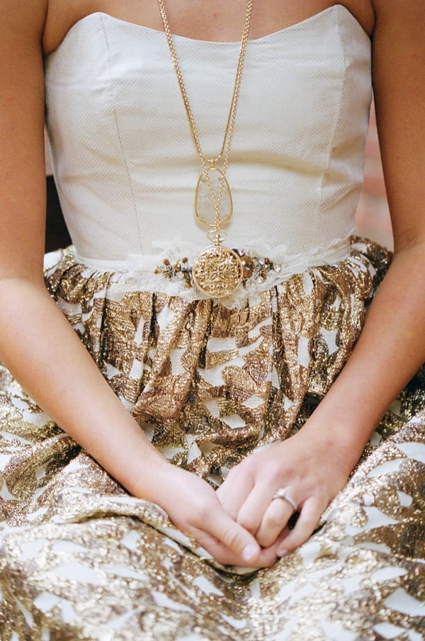 Detail on bride's gold wedding dress