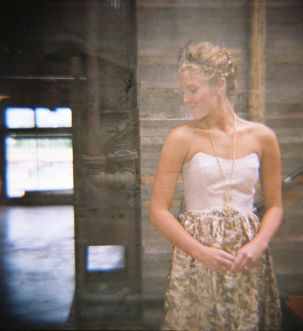 Bride standing looking to side