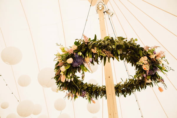 Floral crown around pillar