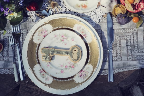 Key shaped biscuit on plate