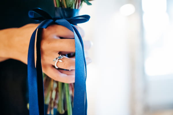 Blue ribbon on bridesmaid bouquet