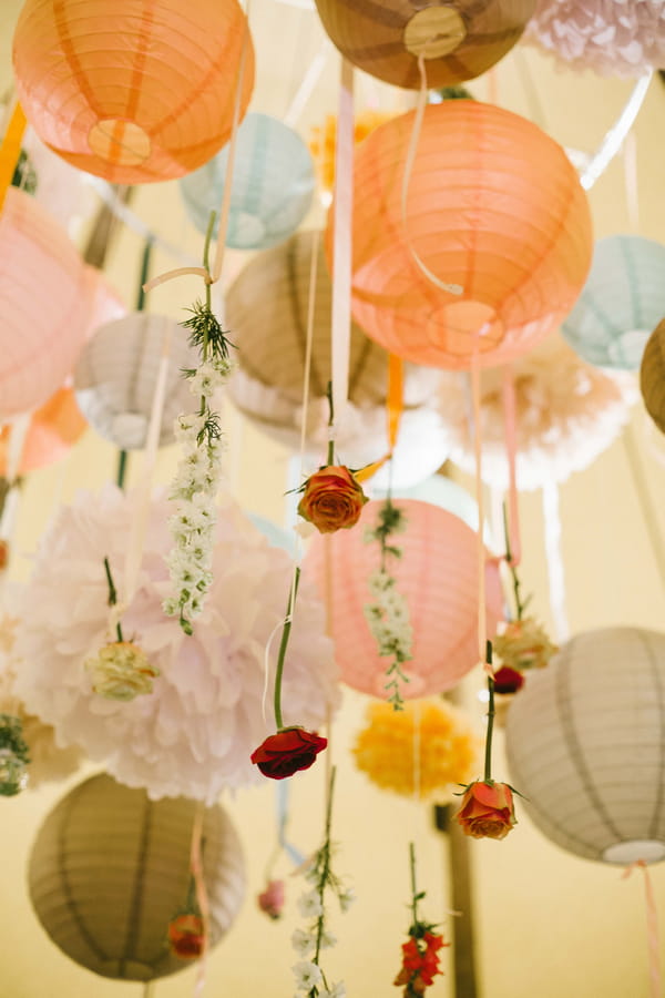 Globe lanterns with hanging flowers