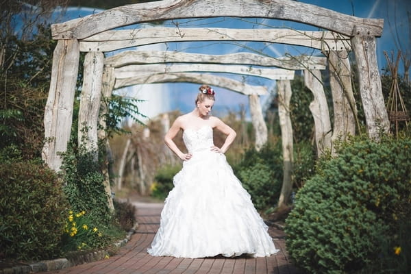 Bride with hands on hips at Eden Project