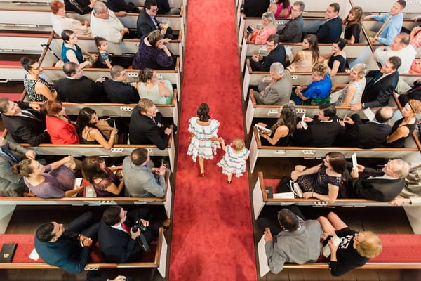 Flower girls walking down aisle