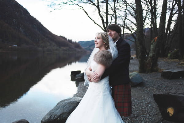 Bride and groom by Loch