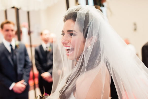 Bride with veil smiling