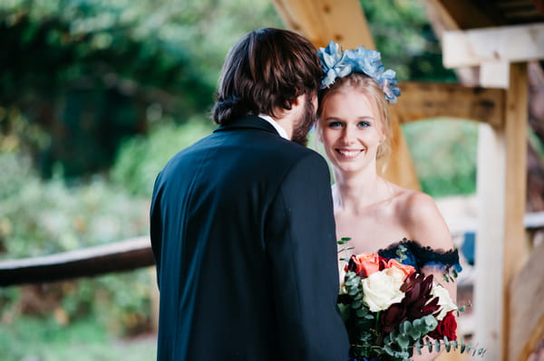 Bride smiling with room