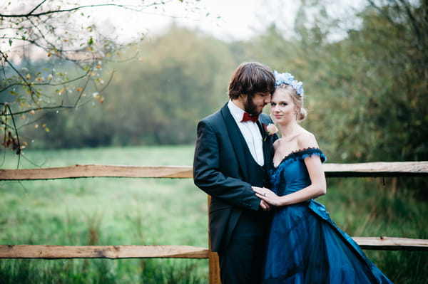 Groom with bride in blue wedding dress