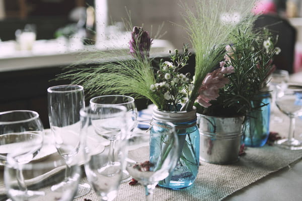 Jar of flowers on wedding table