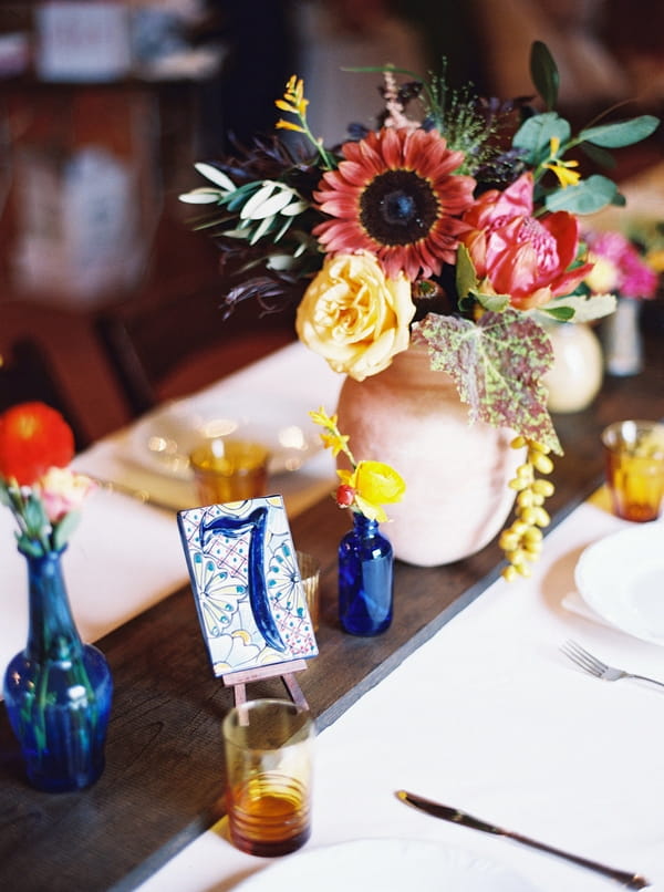 Flowers a table number on wedding table