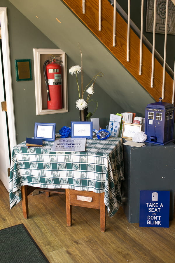 Table with Doctor Who themed wedding items