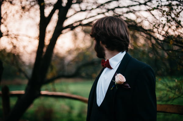 Groom looking over shoulder