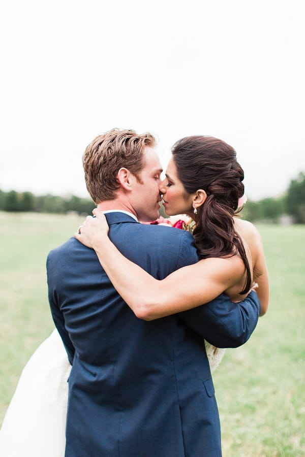 Bride and groom kiss