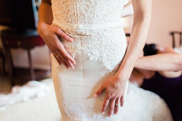 Detail on bride's wedding dress